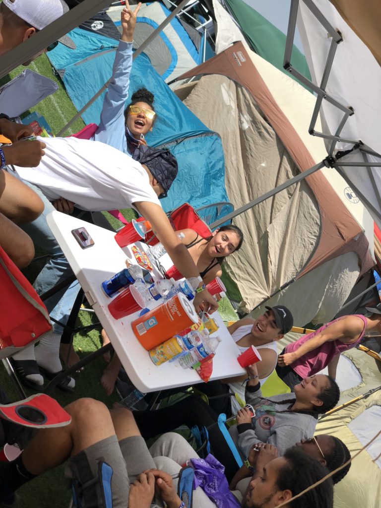 playing uno at coachella car camping area with friends