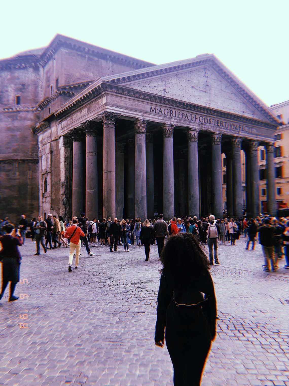 woman staring at The Pantheon in Rome, Italy