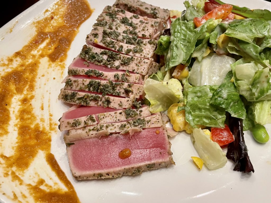 Seared ahi tuna. Sushi-grade ahi tuna, spicy mustard sauce, house salad.